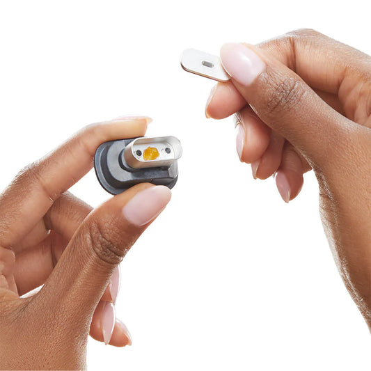 placing a wax in the concentrate insert