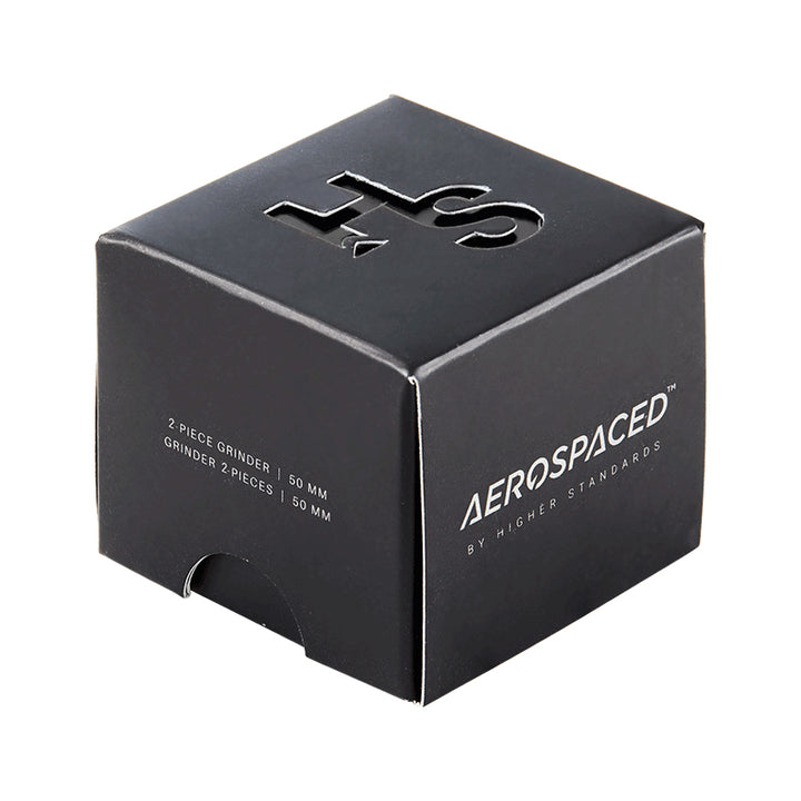 Black 2 piece Aerospaced grinder inside box.